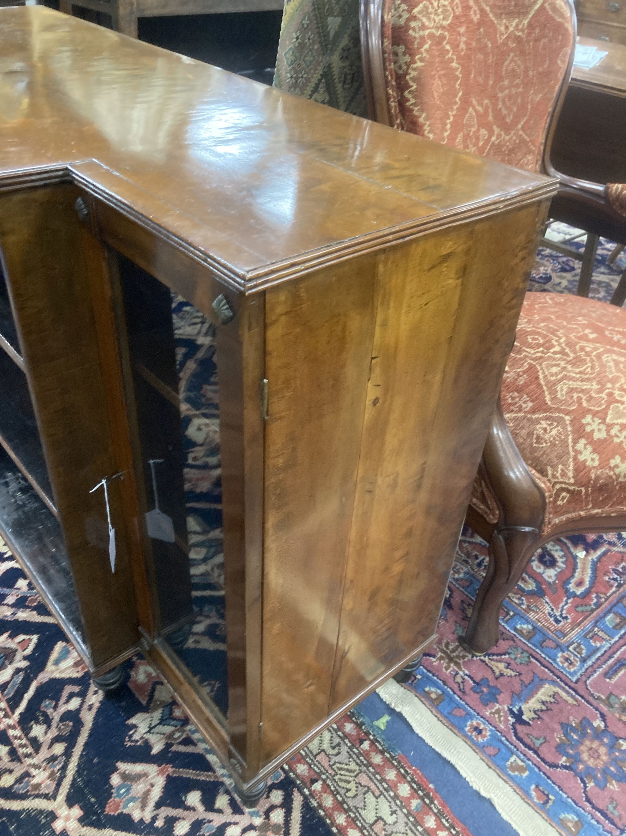 A Regency style mahogany and satinwood dwarf breakfront bookcase, length 112cm, depth 42cm, height 78cm